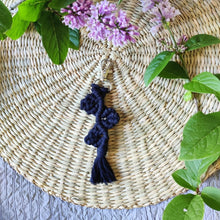 Load image into Gallery viewer, Grapevine Macramé Keychain in colour Black, lilacs on the sides.