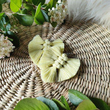 Load image into Gallery viewer, The Feather Babies macramé earrings in colour Canary, green leaves and flowers on the sides.