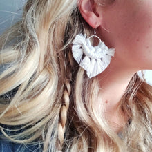 Load image into Gallery viewer, A blonde model wearings Sunburst macramé earrings in a shade Natural.
